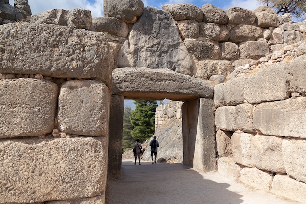 Ancient Greek city Mykines with walls made of giant stones and a bas relief with standing lions