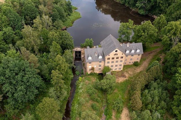 The ancient Katrina mill building in a picturesque location by the lake Krimulda Latvia