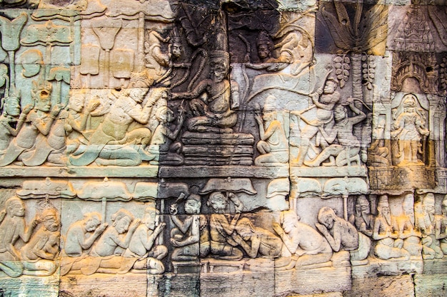 Ancient khmer stone carving in Angkor Thom in Cambodia. May be used as background