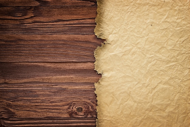 Ancient manuscript against the background of wooden boards