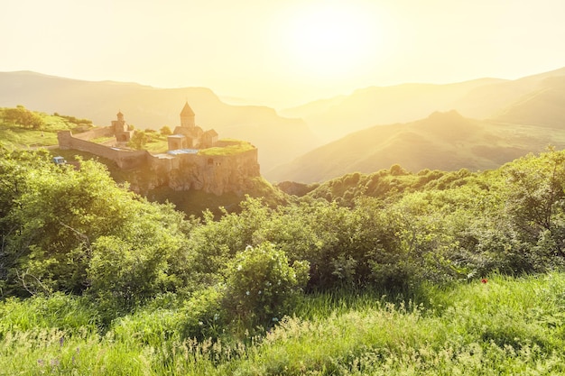 Ancient monastery in setting sun tatev armenia