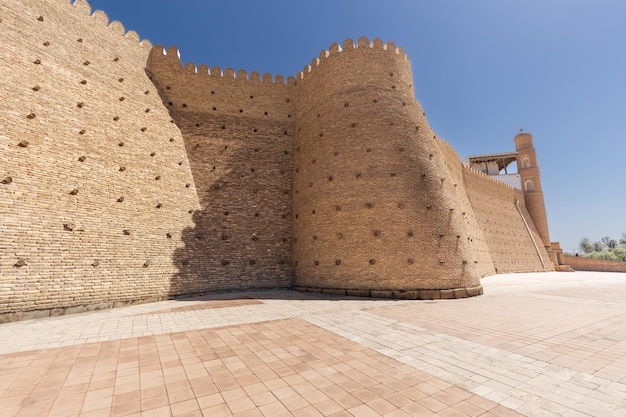 Ancient monumental archaeology heritage Ark citadel with brick walls and towers Bukhara Uzbekistan