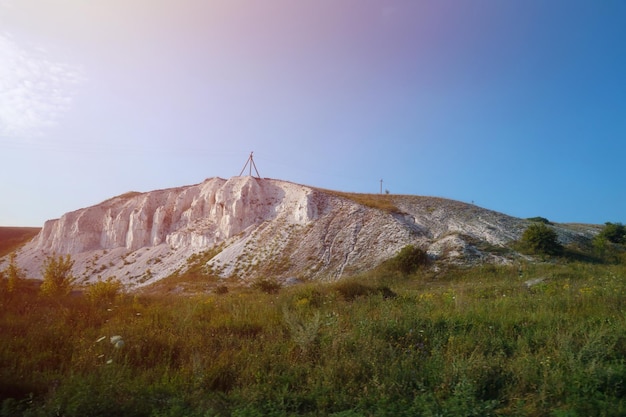 Ancient multimillion chalk mountains on the steppe surface of earth