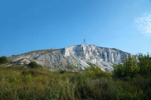 Ancient multimillion chalk mountains on the steppe surface of earth