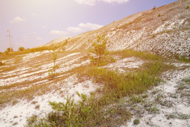 Ancient multimillion chalk mountains on the steppe surface of earth