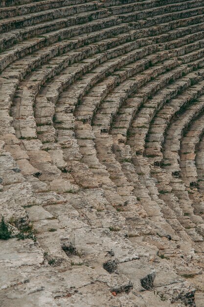 Ancient Roman amphitheater made of stone under the open sky in Pamukkale in Turkey