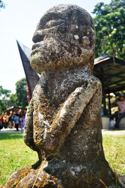 Ancient stone statue of Batu Kursi Raja Siallagan or Huta Stone Chair of King Siallagan for indonesian people and foreign traveler travel visit in Samosir at Sumatera Utara or North Sumatra Indonesia