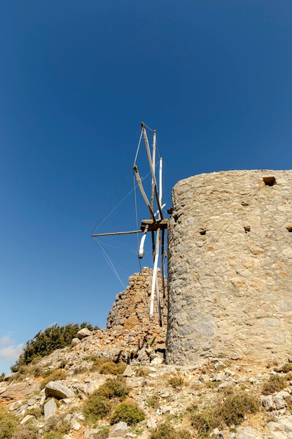 Ancient stone windmills Lassithi area island Crete Greece