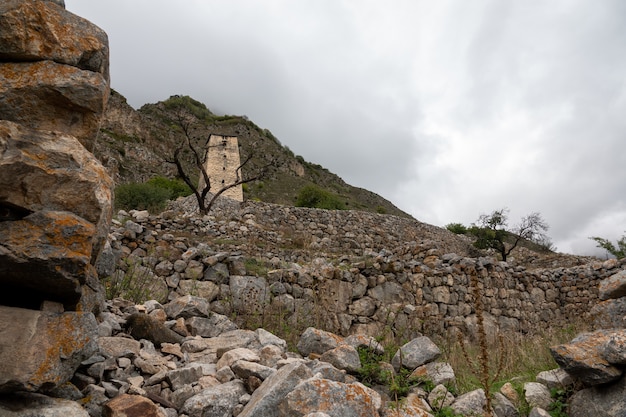 Ancient watchtower abaev in upper balkaria in autumn