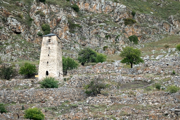 Ancient watchtower abaev in upper balkaria in autumn