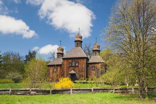 Ancient wooden church near the autumn forest