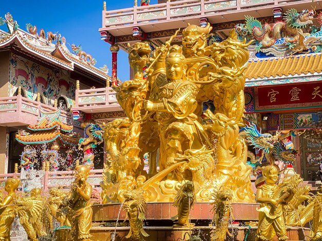 Ang Silla,Chonburi,Thailand -  January 14,2023 Naja statue golden is a beautiful Thai and Chinese