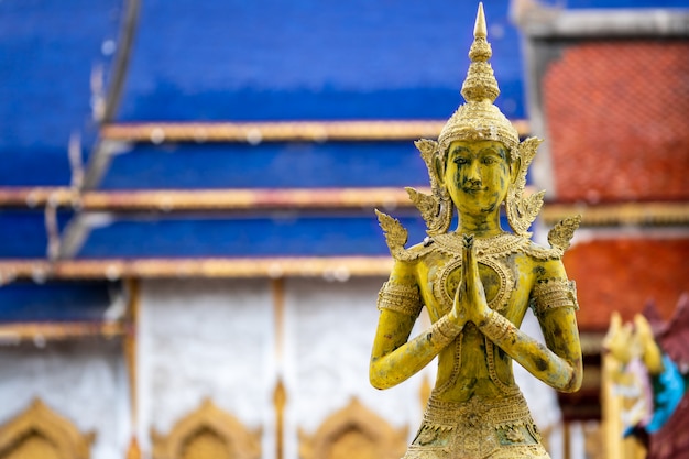 Photo angels statue to pay respect at chiang mai thailand temple. thai buddhism religion and culture.