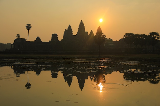 Angkor Wat Temple reflected on the lake at sunrise in Siemp Reap Cambodia Unesco World Heritage