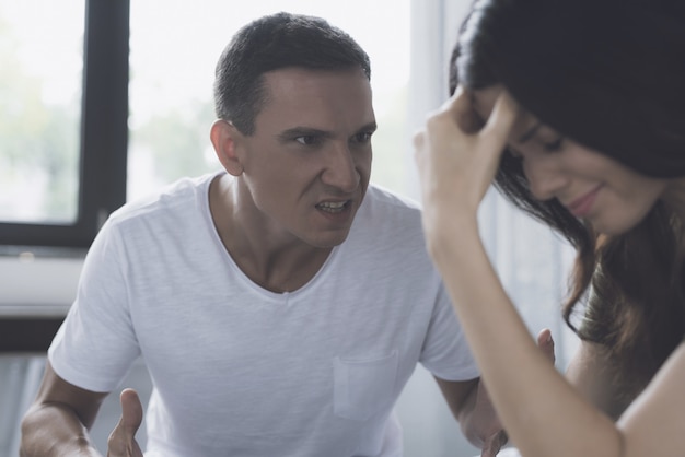 Angry Husband Screams at Wife During Quarrel.