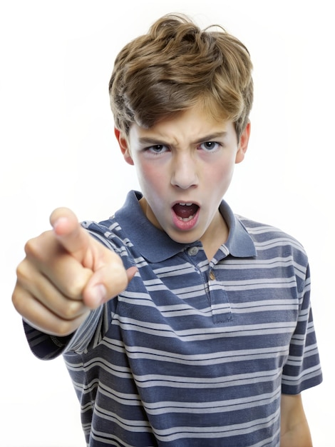 Angry Young Boy Pointing with a Frowning Expression A young boy with brown hair and a striped shir