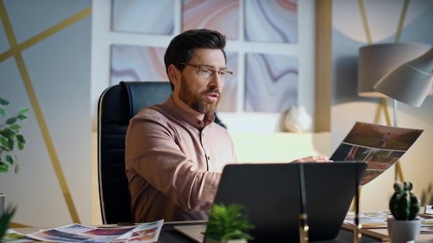 Annoyed manager speaking video meeting in office close up angry boss gesturing