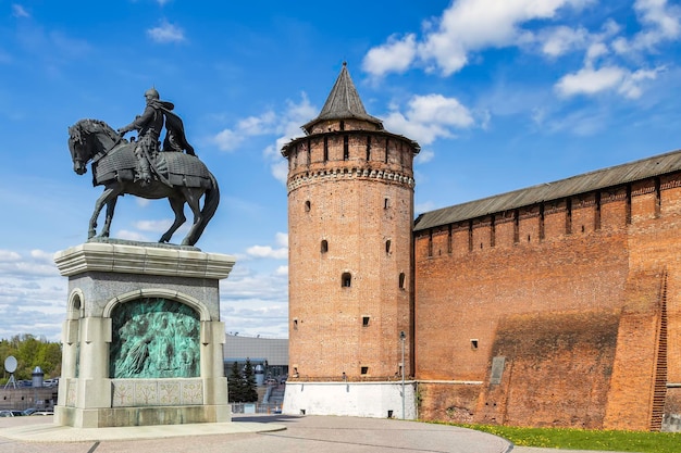 Ansient wall of Kolomna Kremlin and Marinkina tower Dmitry Donskoy monument in Kolomna Moscow region