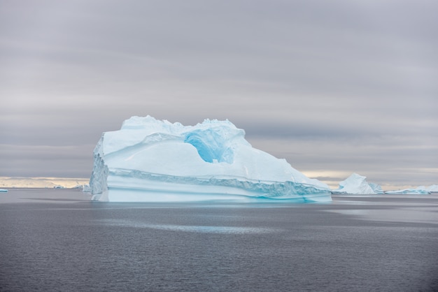 Antarctic landscape with iceberg