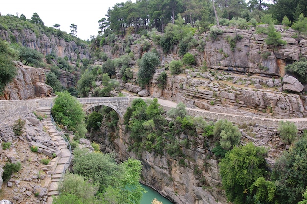 Antic bridge over river