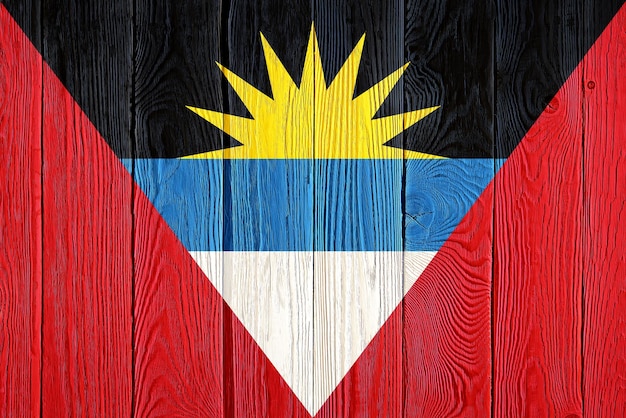 Antigua and Barbuda flag painted on old wood plank background Brushed wooden board texture Wooden texture background flag of Antigua and Barbuda