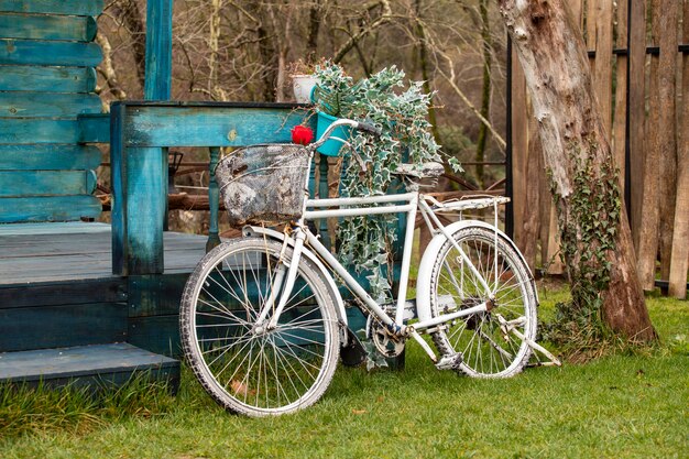 Antique bicycle in front old house