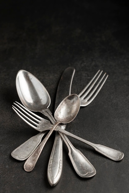 Antique cutlery on the table Vintage cutlery