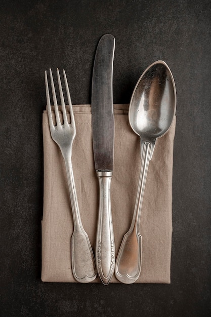 Antique cutlery on the table Vintage cutlery