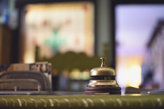 Antique doorbell on the reception desk of a rural hotel