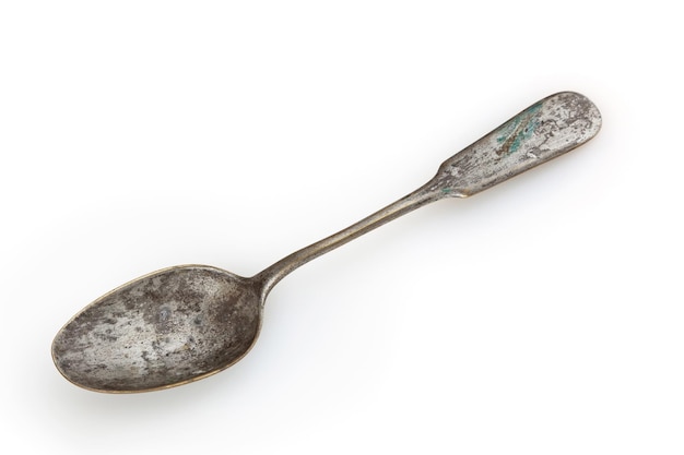 Antique spoon isolated on white background with clipping path