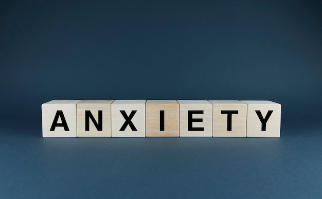 Anxiety Cubes form the word Anxiety Concept of Anxiety emotional state