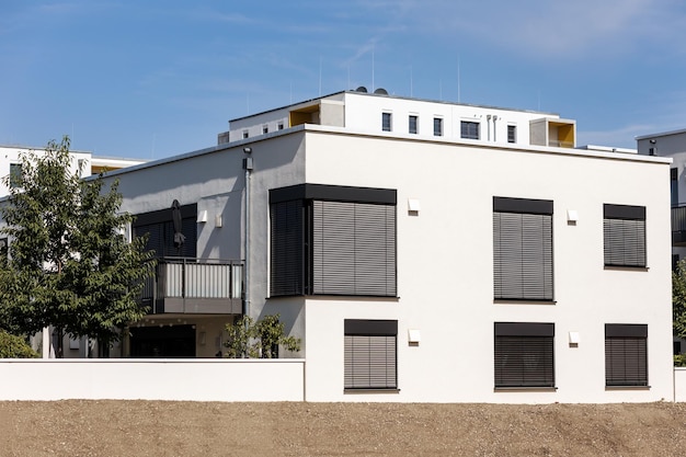 Apartment Building Modern Exterior Design. Outdoor Shutters or Roller Blinds Outside of House.