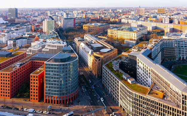 Apartment in residential building exterior. Housing structure at blue modern house of Europe. Rental home in city district on summer. Architecture for business property investment in Berlin, Germany.