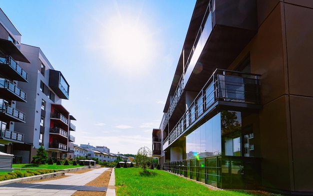 Apartment in residential building exterior. Housing structure at blue modern house of Europe. Rental home in city district on summer. Architecture for business property investment, Vilnius, Lithuania.