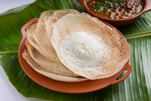 Photo appam or velliappam or kallappam  or paalappam tasty delicious  breakfast item in south india