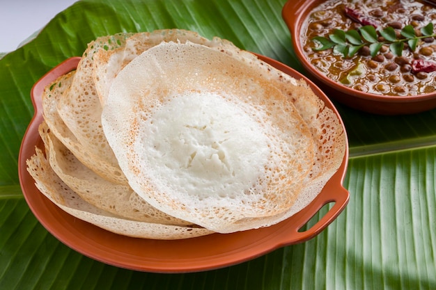 Photo appam or velliappam or kallappam  or paalappam tasty delicious  breakfast item in south india