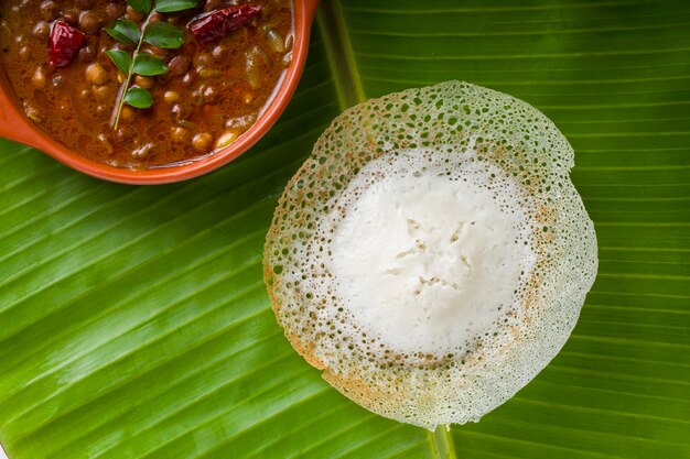 Photo appam or velliappam or kallappam  or paalappam tasty delicious  breakfast item in south india