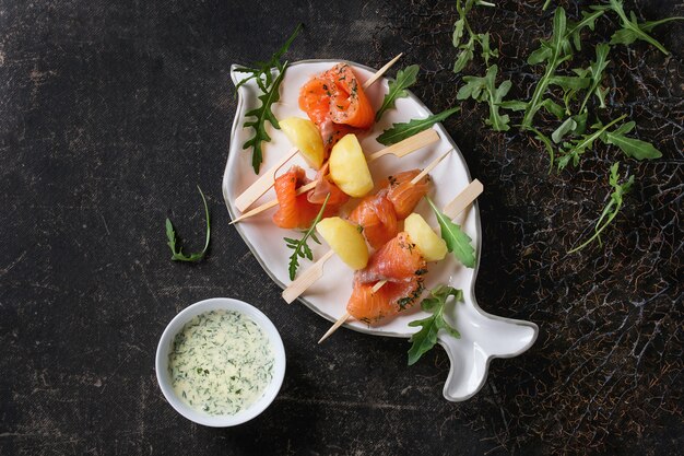 Appetizer with smoked salmon and potatoes