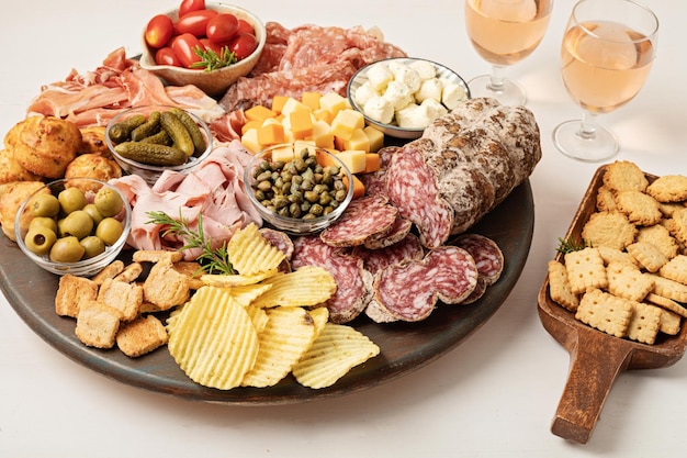 Appetizers table with different antipasti charcuterie snacks cheese