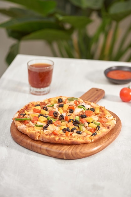 Appetizing homemade pizza on a white background