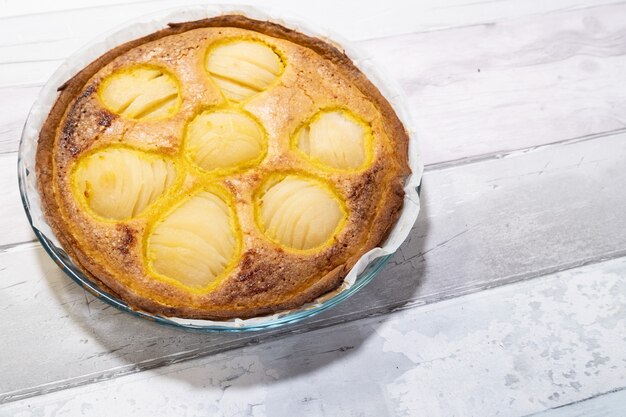 Appetizing pear tart made at home in the old way in France