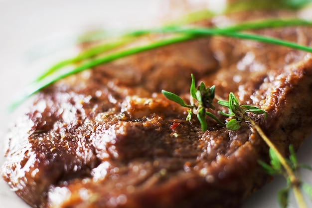 Appetizing roasted steak herbs