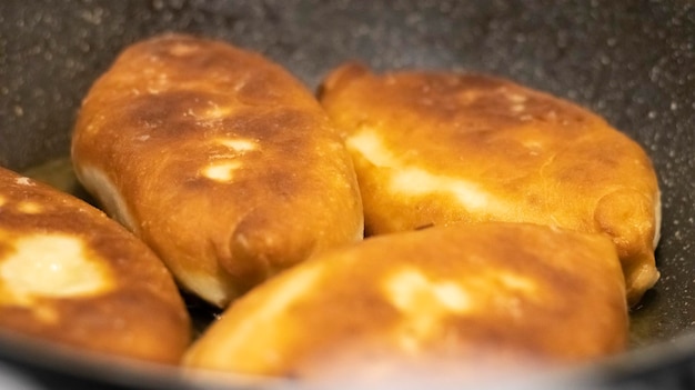 Appetizing savory fried pies Traditional fresh freshly made homemade stuffed pies also known