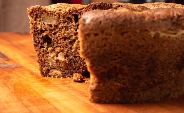 Apple and cinnamon cake on a rustic wooden surface selective focus