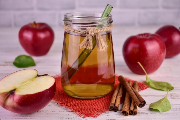 Apple juice. Juice from red apples in a jar.