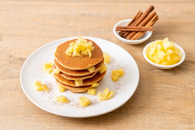 apple pancake or apple crepe with cinnamon powder