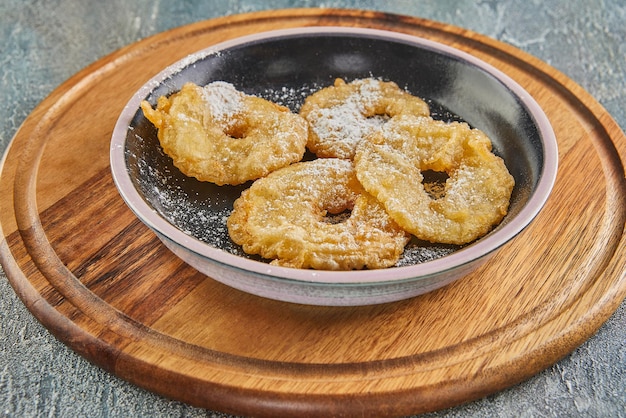 Apple Pancake Apple donut on black plate