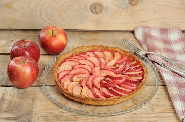 Apple pie on wooden background