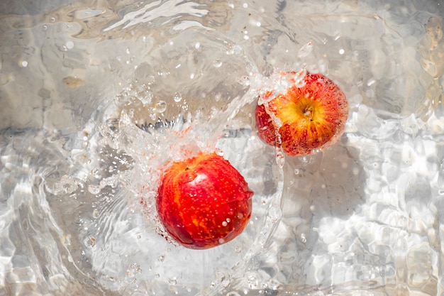 Apple splashes in water