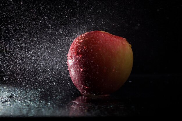 Apple in spray